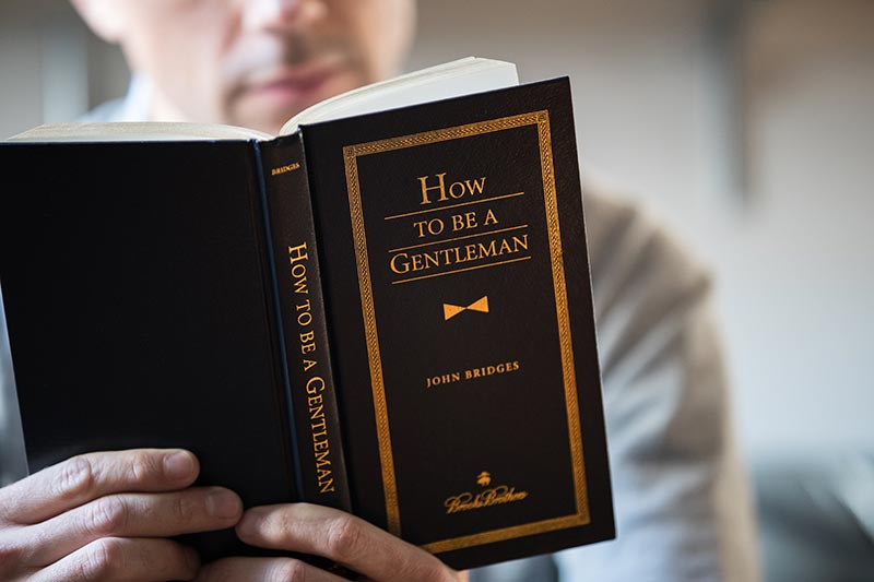 reading-how-to-be-a-gentleman-book-being-a-gentleman-john-bridges-brooks-brothers